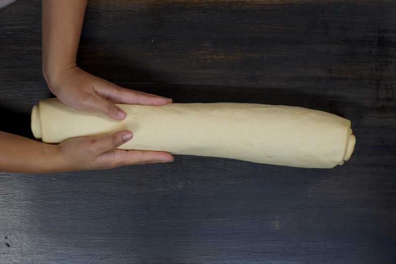 stretch it to even out the dough